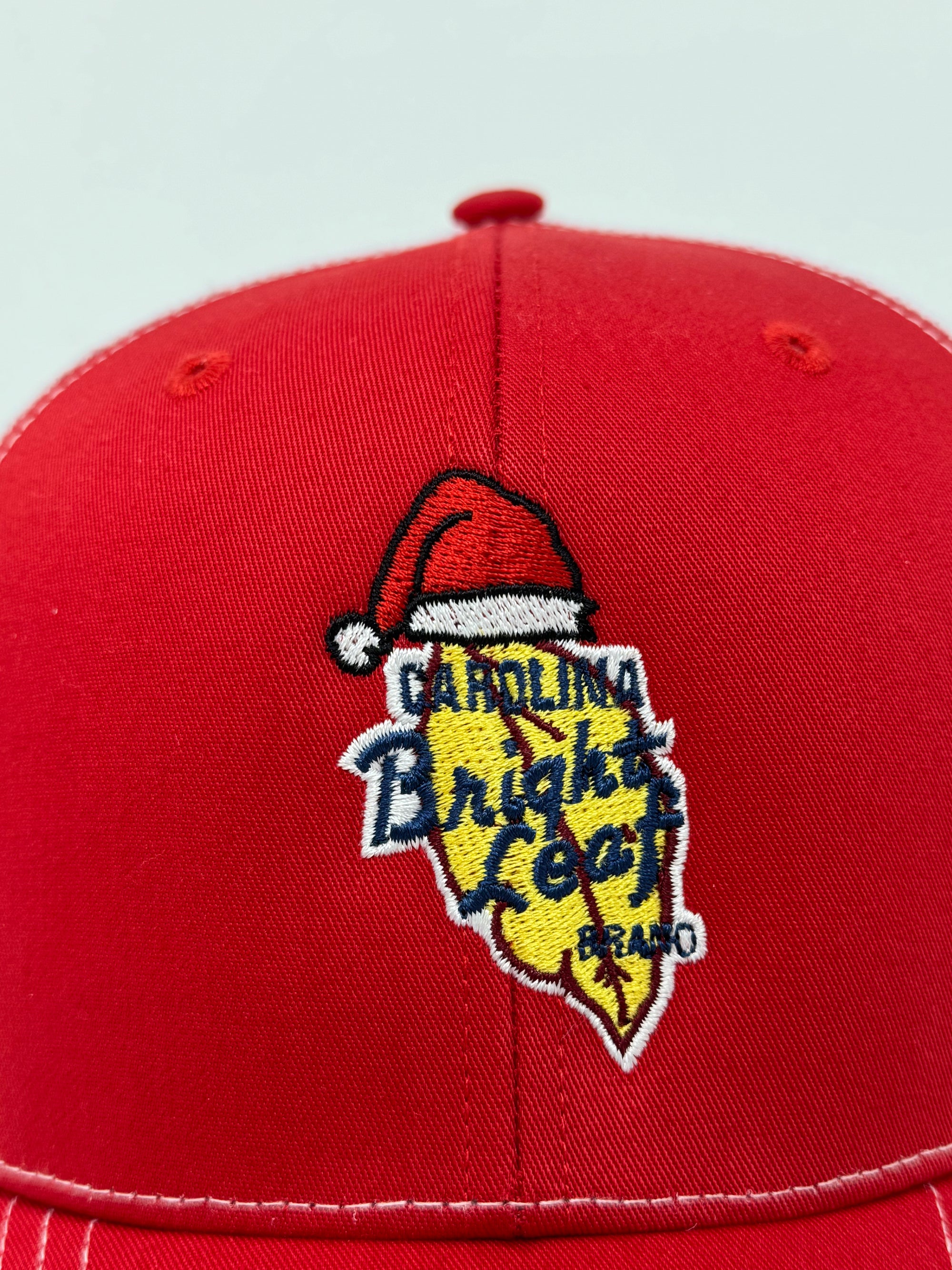 Bright Leaf Hats: Merry Christmas Hat | Carolina Packers Inc